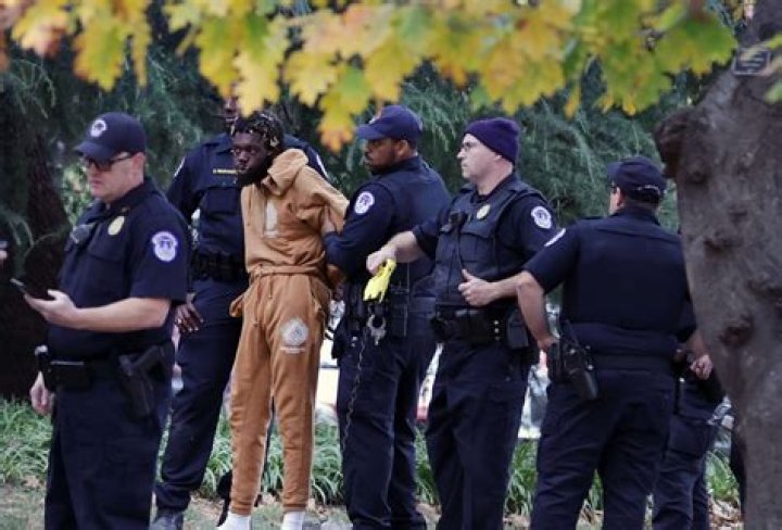 A Black pastor sues the police who arrested him while watering his neighbors' flowers |