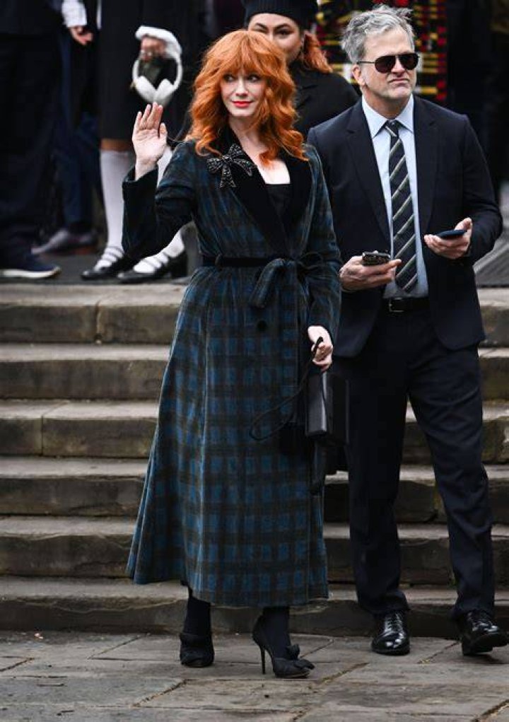 Christina Hendricks, 48, shows off her drastic weight loss in a swimsuit as she takes a dip in ocean