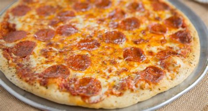 Discover The Culinary Revolution: Revolve Pizza Decoded
