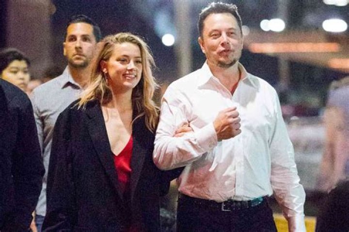 Elon Musk Posts Amber Heard Photo in Which Shes Dressed Like Mercy Hollywood Life