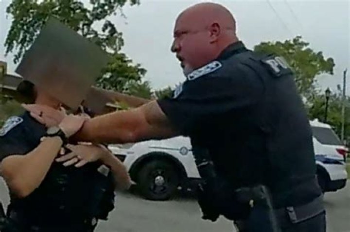 Florida sergeant seen grabbing female cop by throat charged