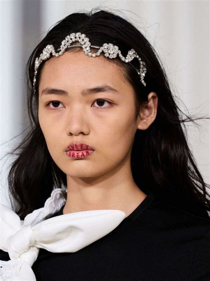 See All of Doja Cat's Wild Paris Fashion Week Beauty Looks: Pics
